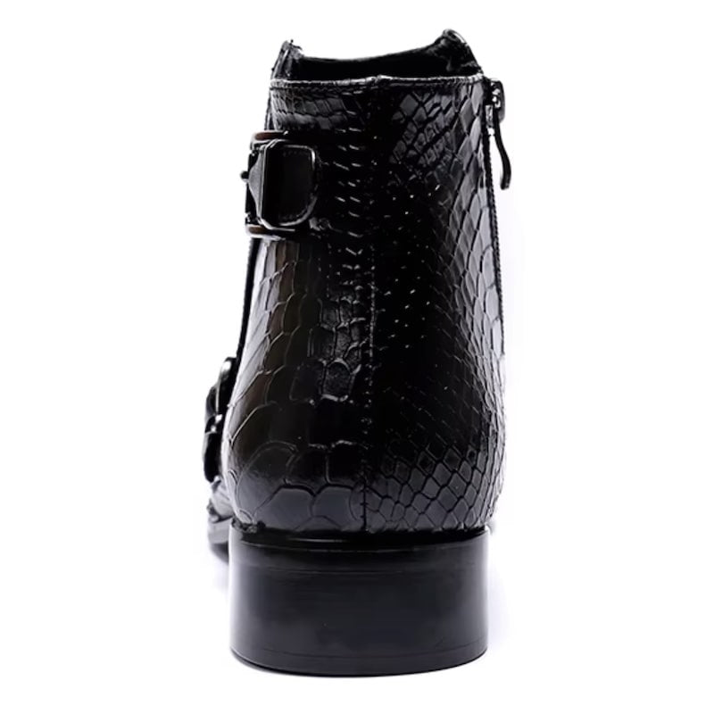 Back view of a black, textured leather ankle boot with buckle and zipper.