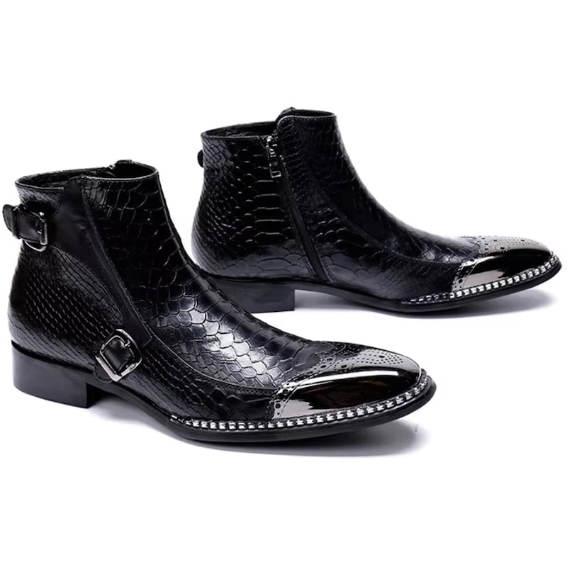 Two black, glossy, reptile-patterned leather ankle boots with silver metal toe caps and buckle straps.