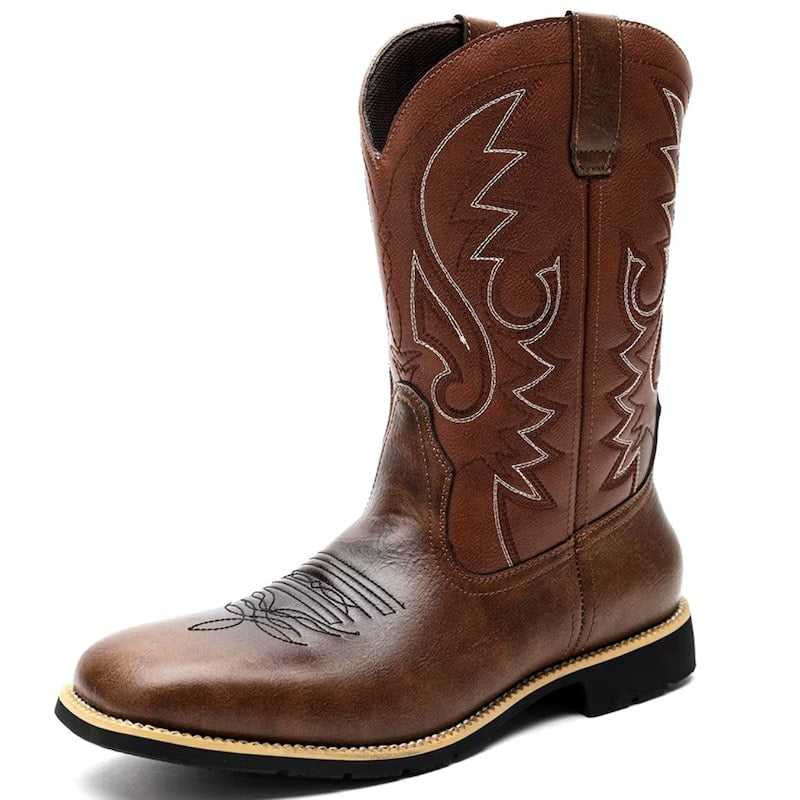 Brown leather cowboy boot with decorative stitching.