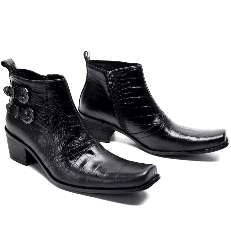 Two black crocodile-skin cowboy boots.