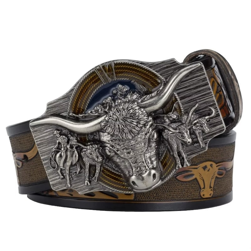 Close-up of a silver and bronze belt with an ornate, detailed silver buckle showing a bull with large horns, a cowboy on horseback, and two additional cattle. The belt itself is brown and has bull head designs on it.
