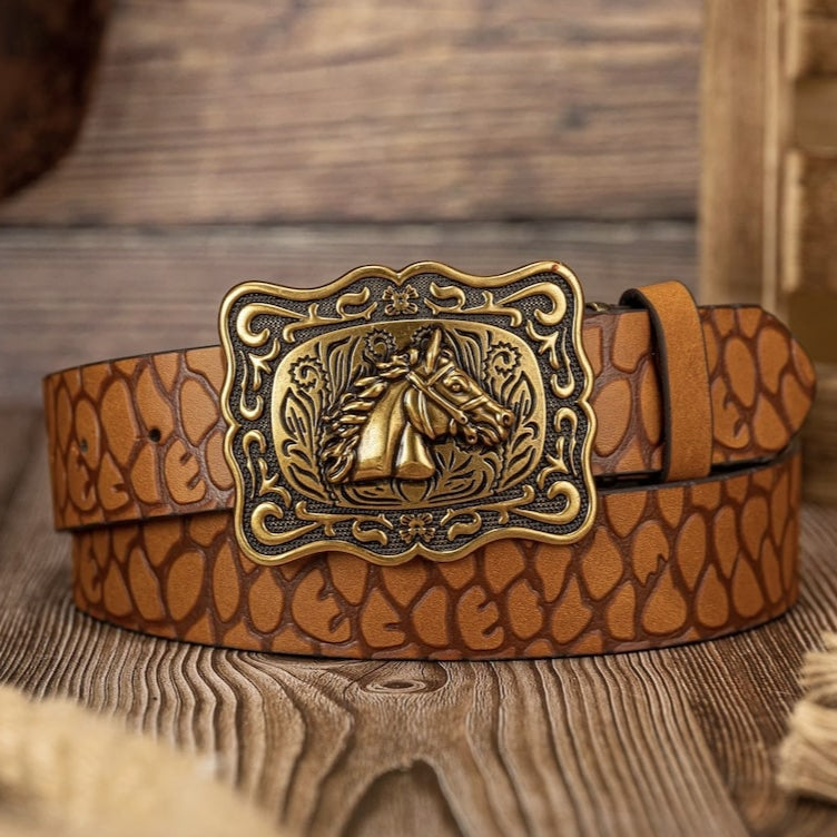 Close-up of a brown leather belt with a horse-shaped buckle on a wood surface.