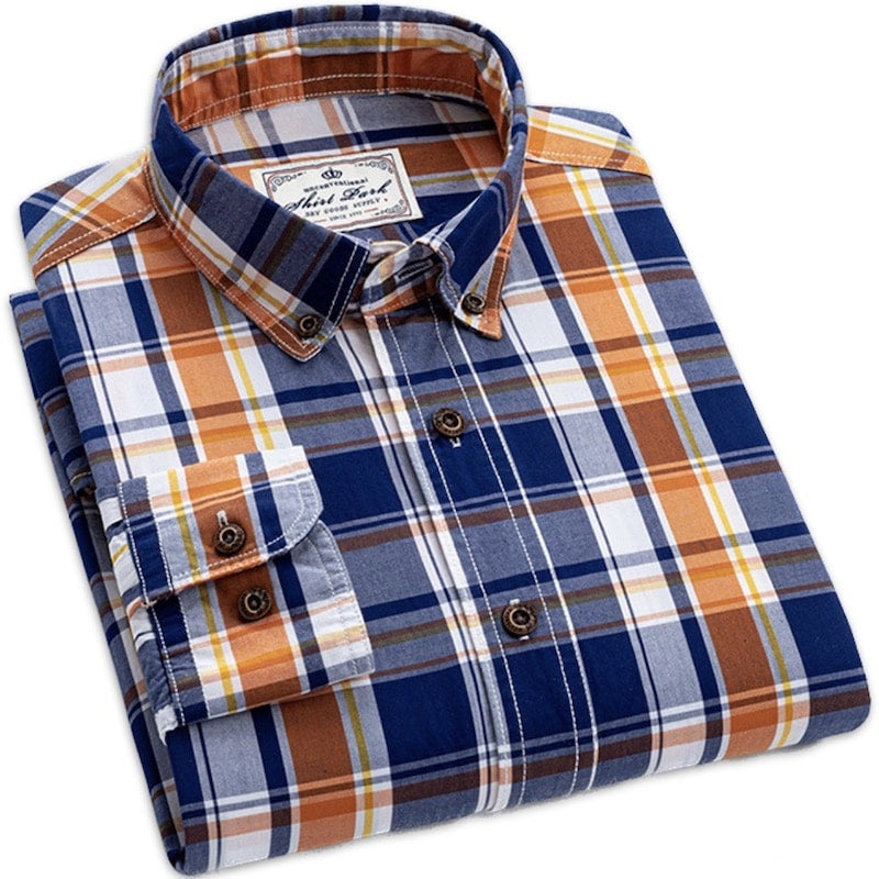 Folded plaid shirt with blue, brown, and white pattern.