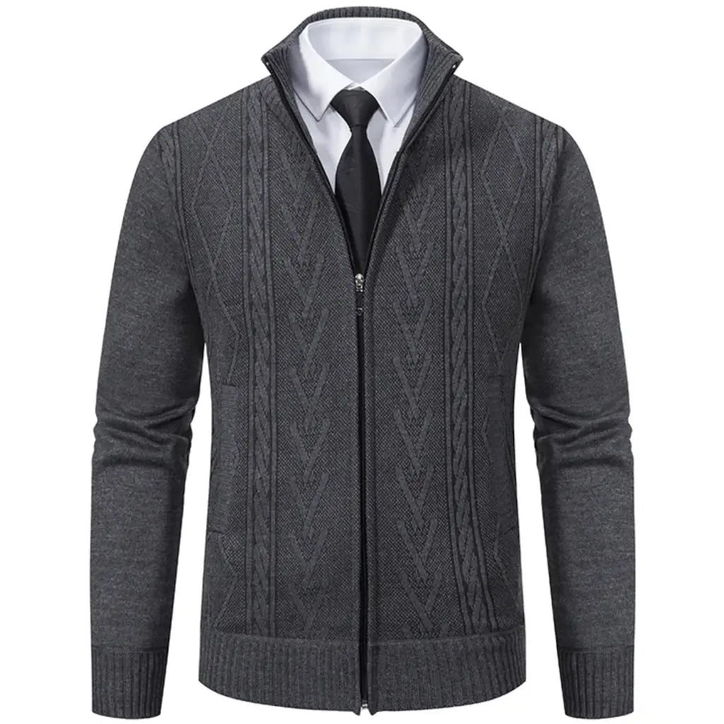 Gray zip-up sweater over a white collared shirt and black tie.