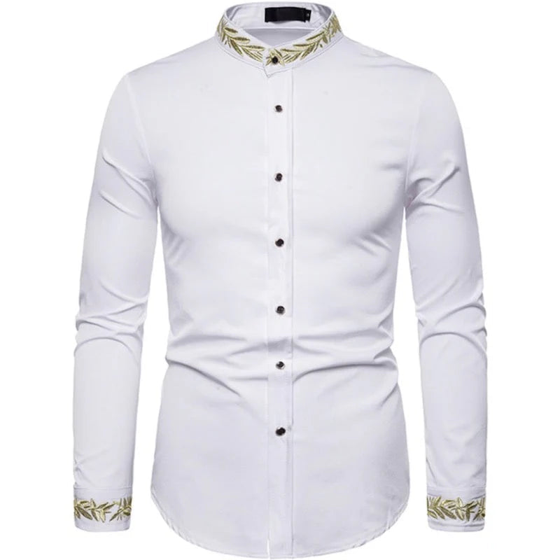 White, long-sleeved button-up shirt with gold leaf embroidery at the collar and cuffs.