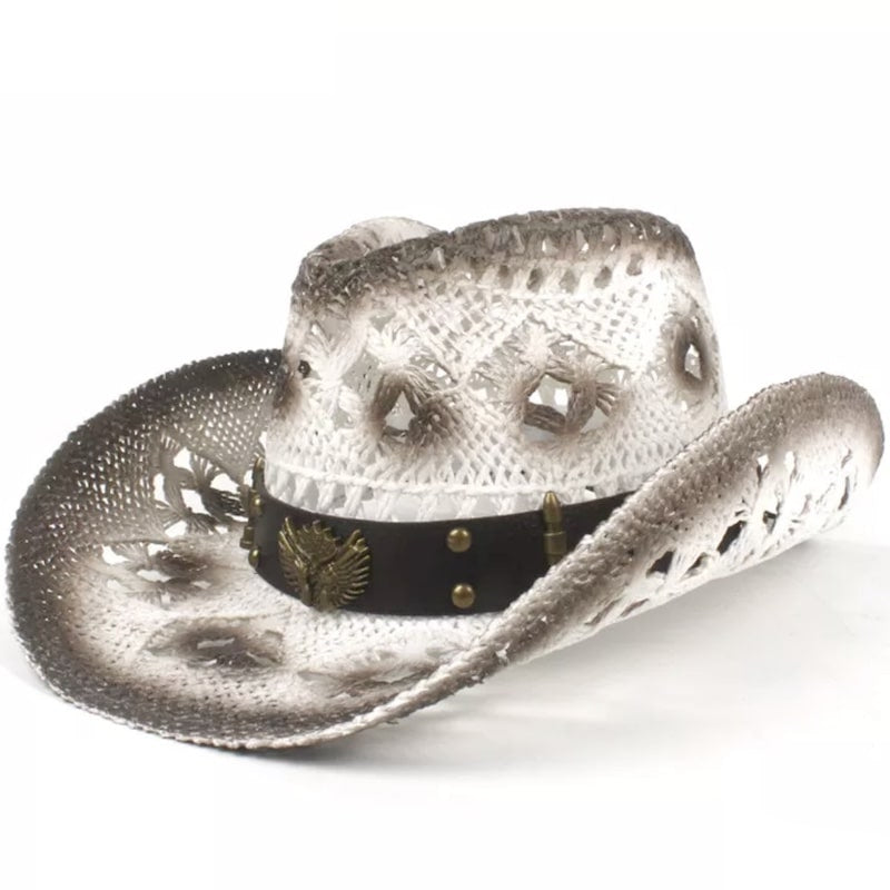 Woven white and brown cowboy hat with a black leather band featuring an eagle emblem and bullet embellishments.
