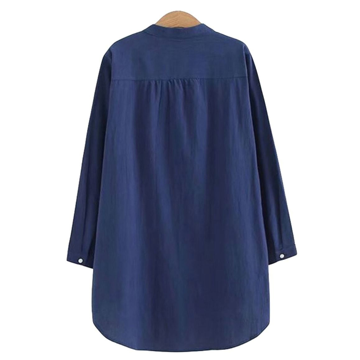 Back view of a long-sleeved, blue, collared shirt on a wooden hanger.