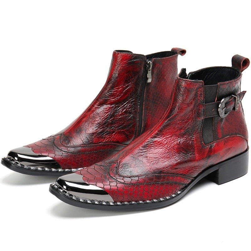 Pair of red leather ankle boots with metal toe caps.
