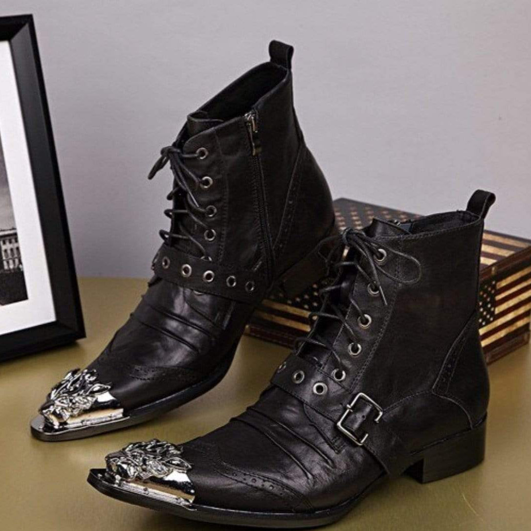 A pair of black leather boots with silver toe caps.