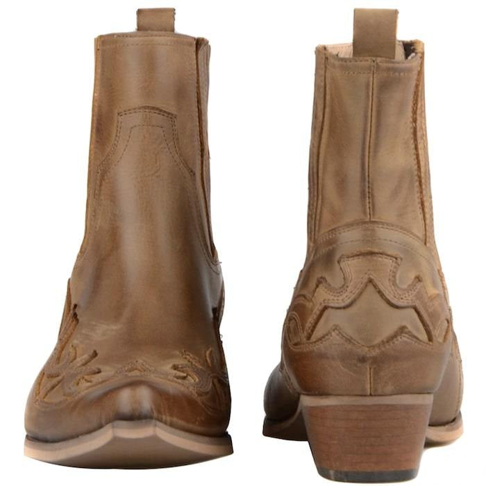 Two brown leather cowboy boots.