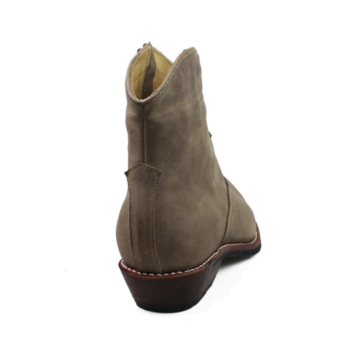 Back view of a grey suede ankle boot with a brown heel.
