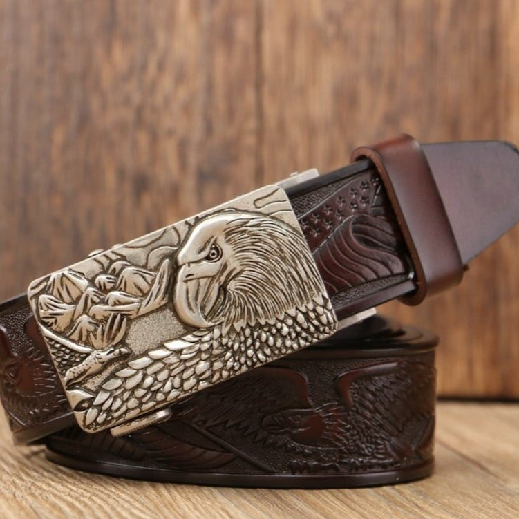 Dark brown leather belt with silver eagle buckle.
