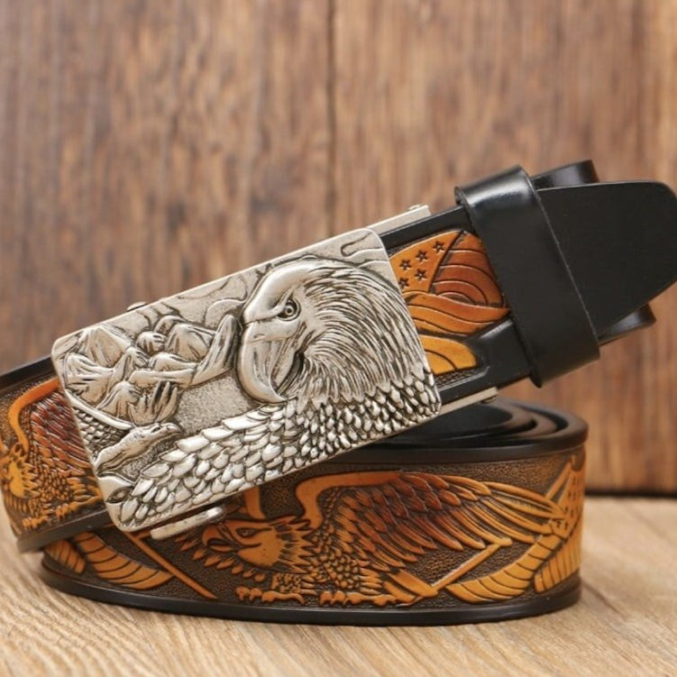 A leather belt with an eagle and flag design on the strap, paired with a silver buckle featuring an eagle.