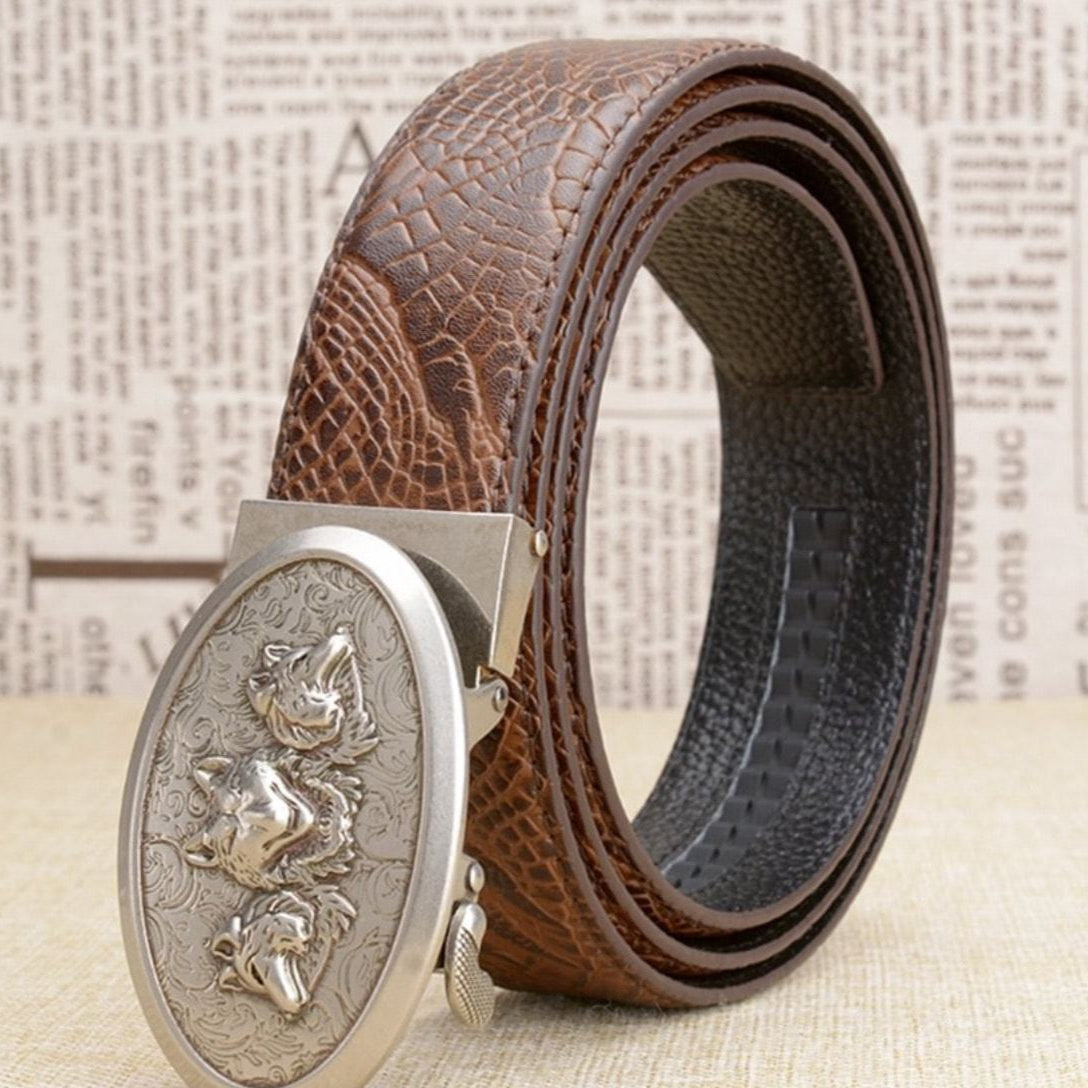 Brown leather belt with a silver wolf buckle.
