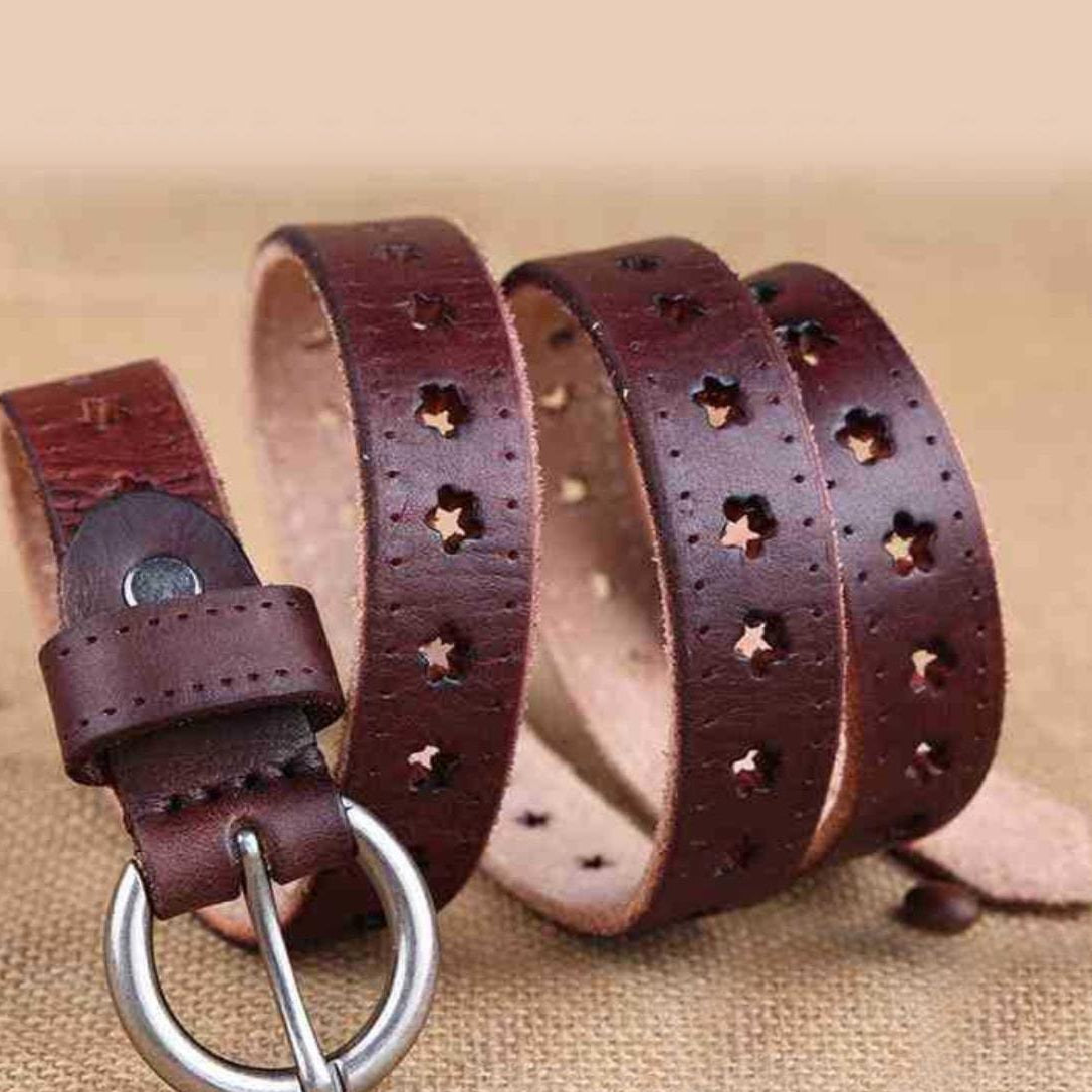 Brown leather belt with star cutouts and a silver buckle.
