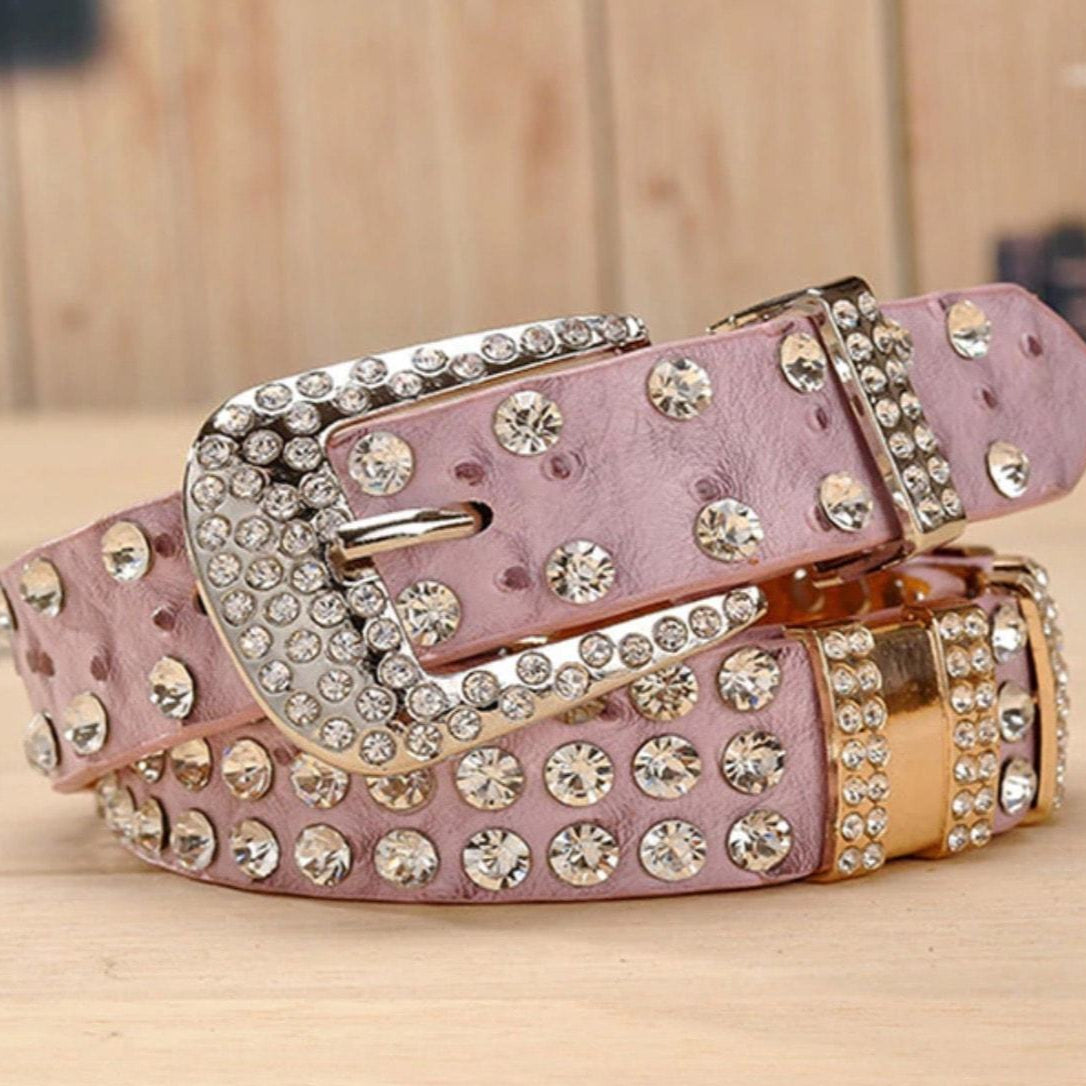 A pink and silver jeweled belt.