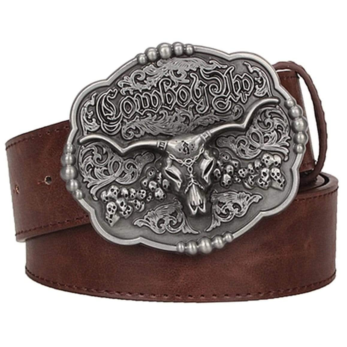 Brown leather belt with an ornate silver buckle featuring a bull skull and the words "Cowboy Shop."

