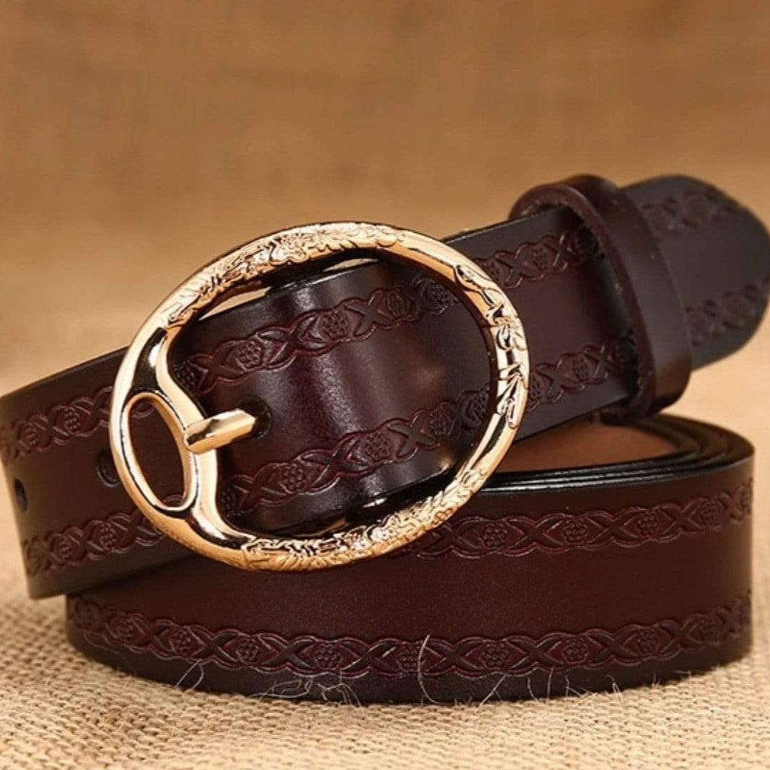 Brown leather belt with gold oval buckle.
