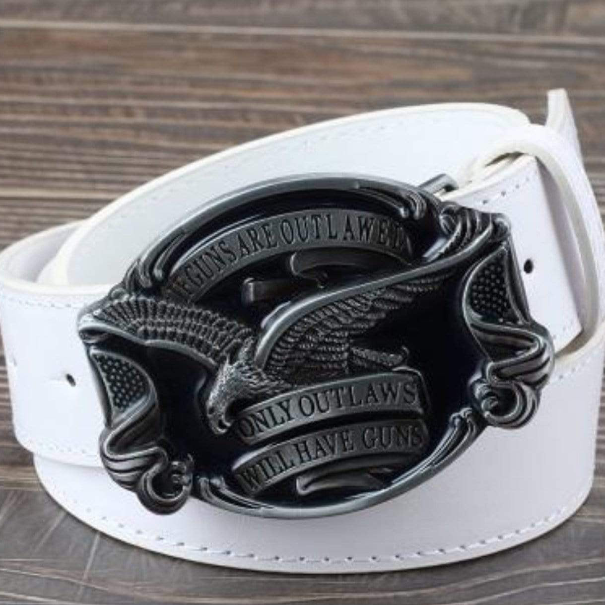 White belt with a metal buckle featuring an eagle and the words "if guns are outlawed, only outlaws will have guns."
