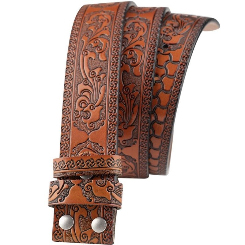 Brown leather belt with embossed floral and geometric patterns.