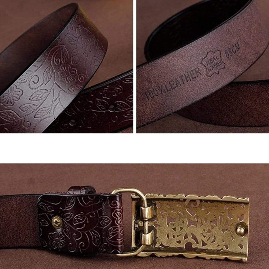Brown leather belt with floral pattern and decorative gold buckle.
