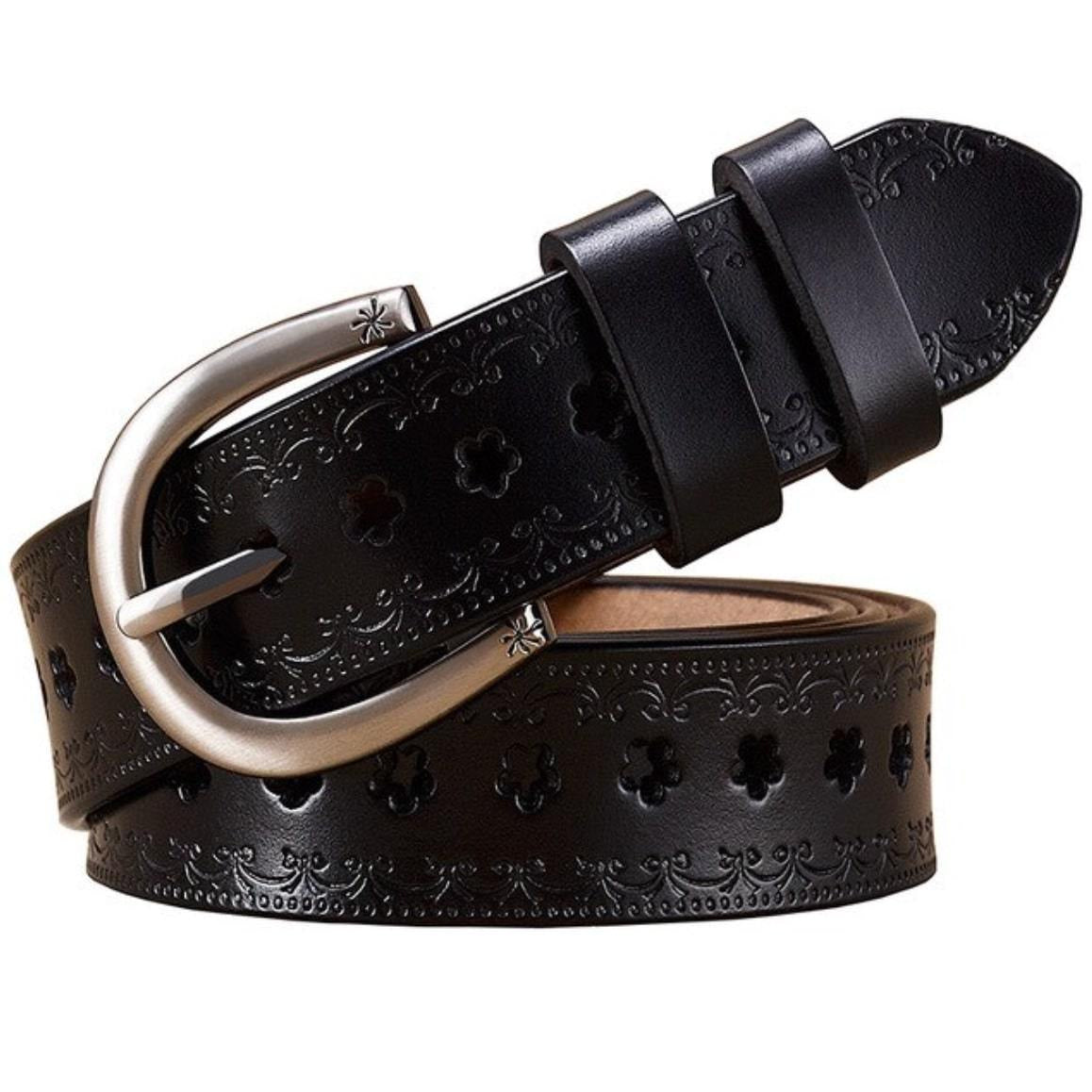 Black leather belt with floral cutouts and a silver buckle.
