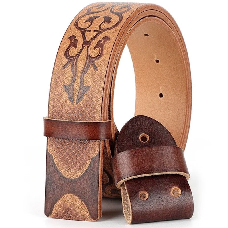 Close-up of a brown leather belt with decorative etching.
