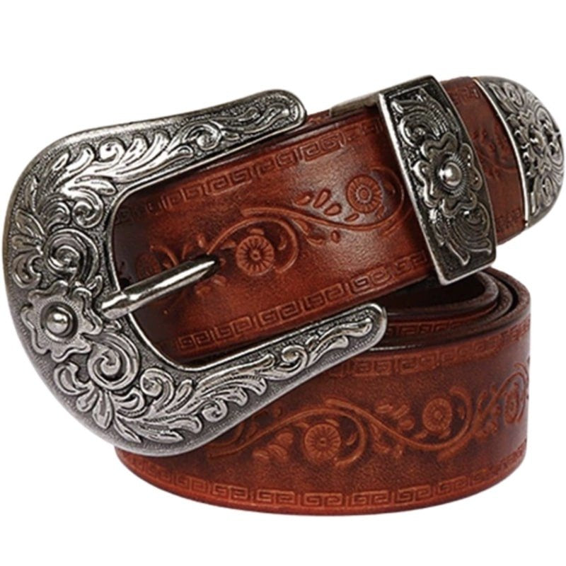 Brown leather belt with embossed floral designs and ornate silver buckle.
