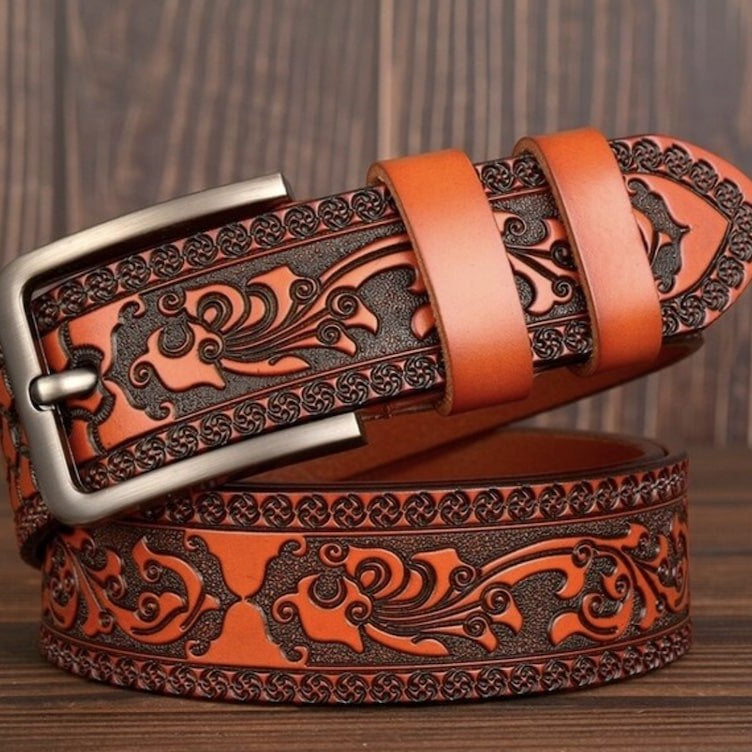 Embossed brown leather belt with silver buckle.
