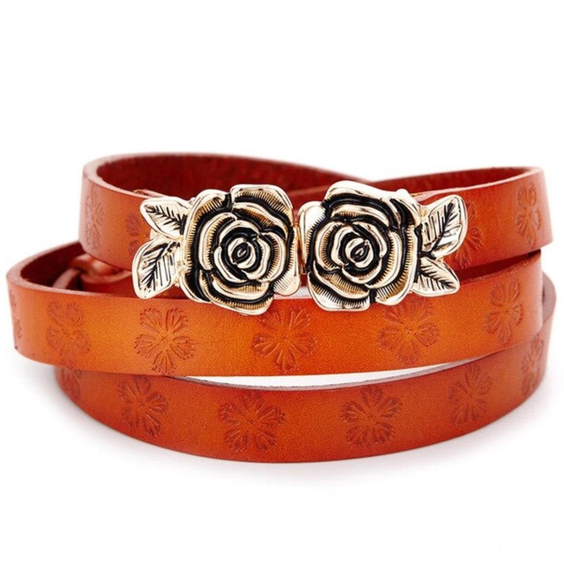 Brown leather wrap belt with rose-shaped metal buckle.
