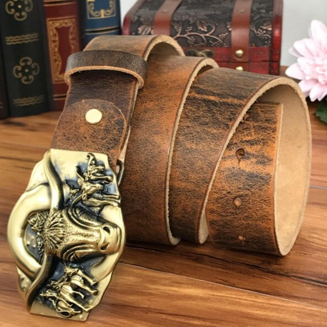 Brown leather belt with ornate gold buckle.
