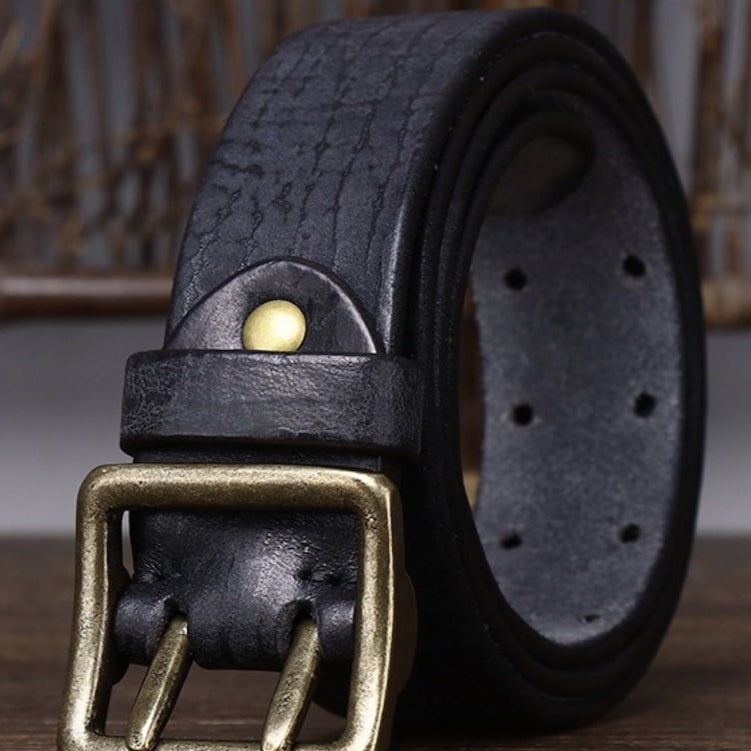 Black leather belt with a brass buckle.
