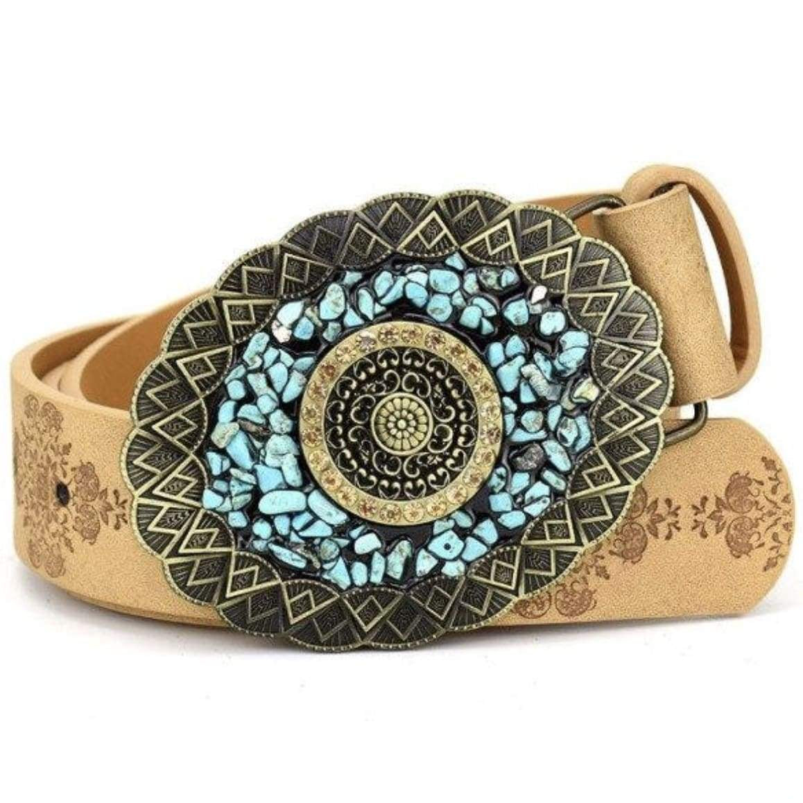 A tan leather belt featuring a large, ornate buckle with turquoise stones.
