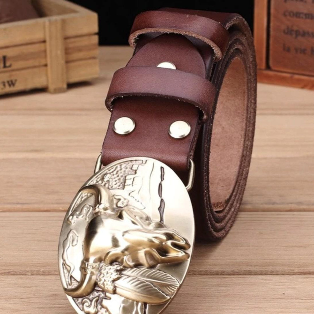 Brown leather belt with a gold bull buckle.
