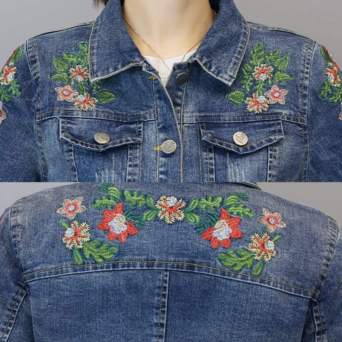 Blue denim jacket with floral embroidery.
