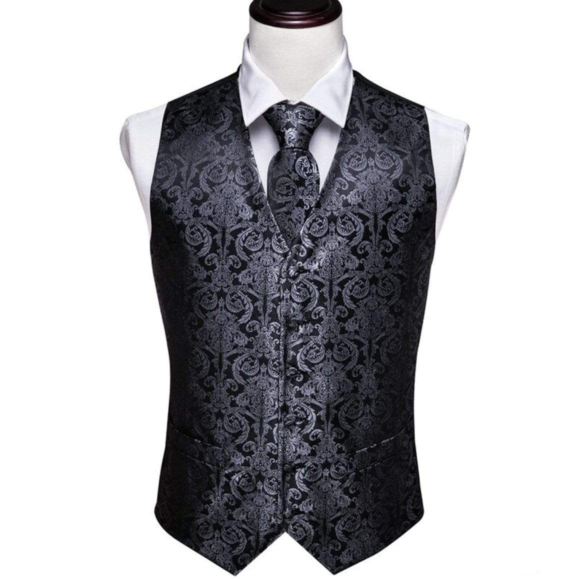 Black paisley vest and tie on a mannequin.