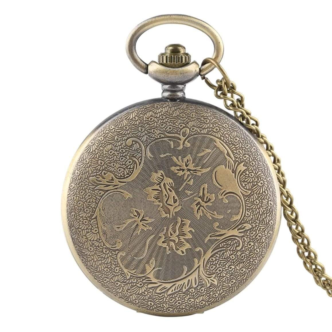 Brass pocket watch with floral detailing.