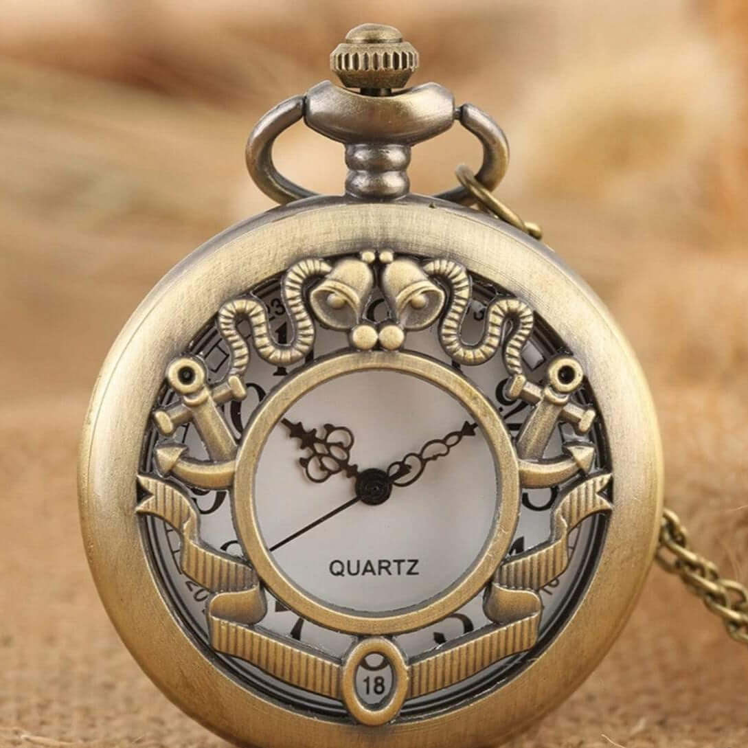 Bronze-colored quartz pocket watch with decorative nautical elements.