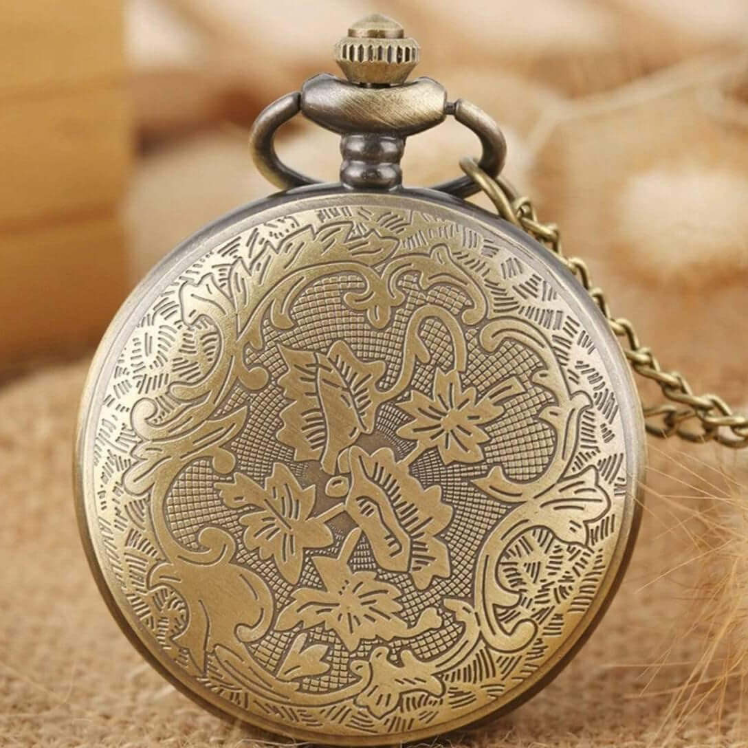 Ornate brass pocket watch.
