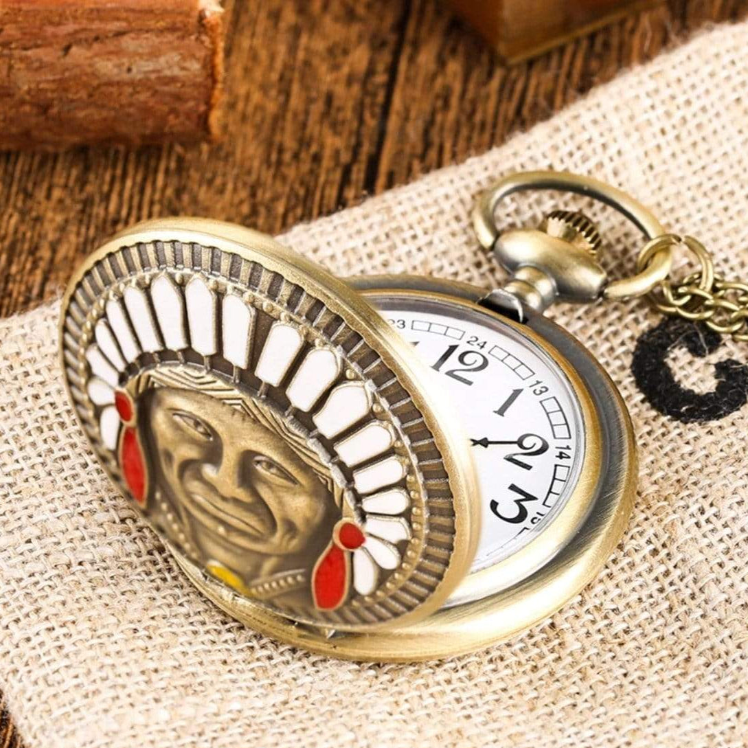 Antique pocket watch with Native American design.