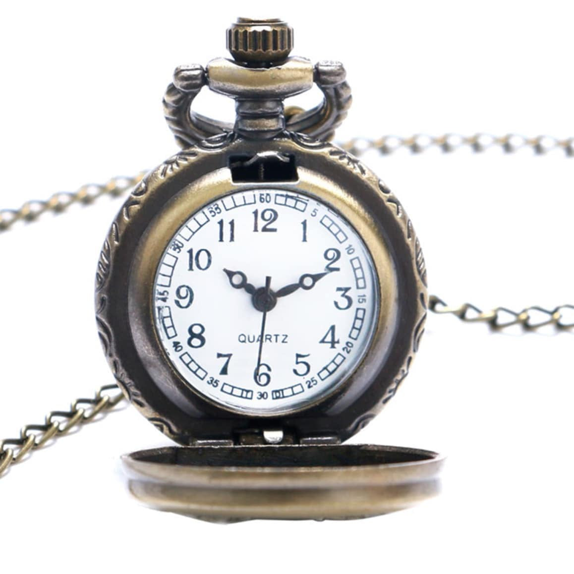 Close-up of an antique bronze pocket watch with a chain and an open lid.