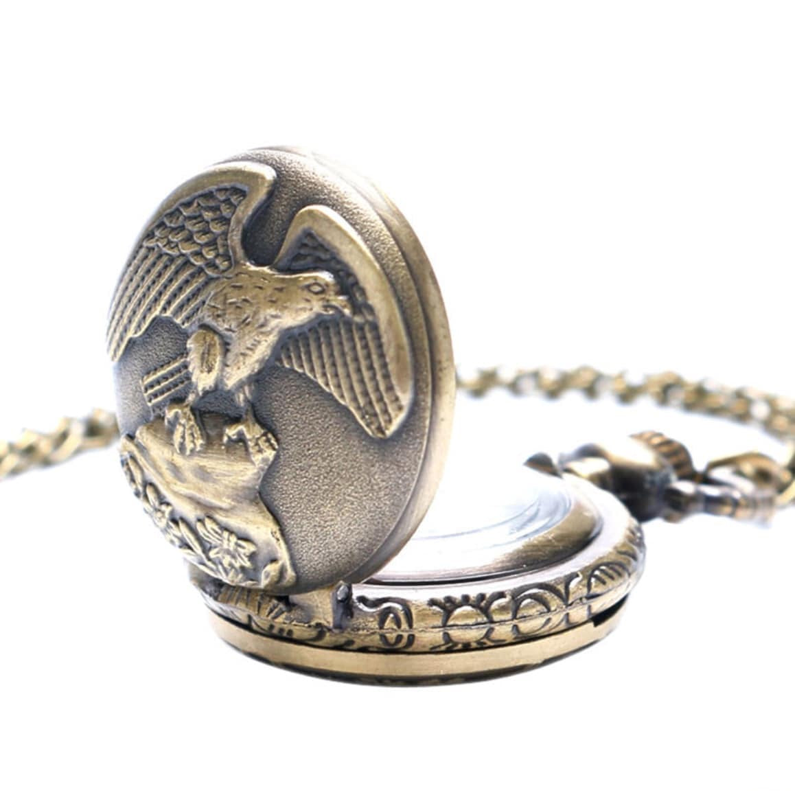 Bronze pocket watch with eagle design.
