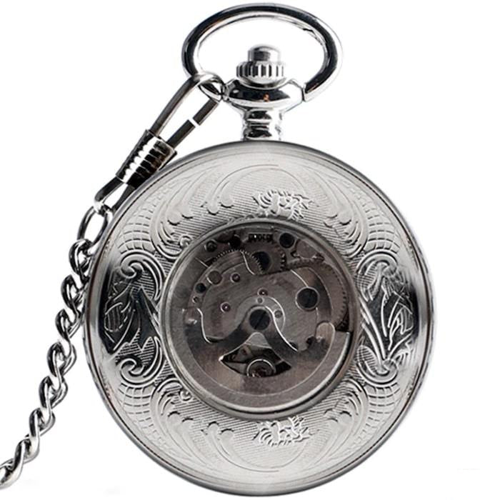 Silver pocket watch with intricate detailing.
