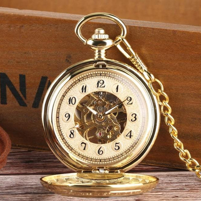 Gold open-face pocket watch with a chain.
