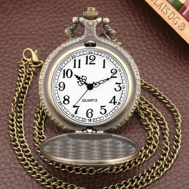 Antique bronze quartz pocket watch with chain.
