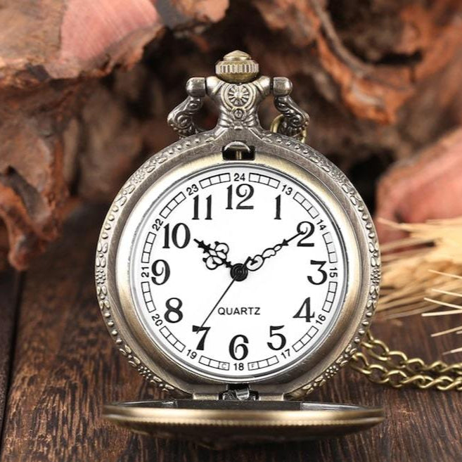 Antique-style pocket watch with quartz movement.
