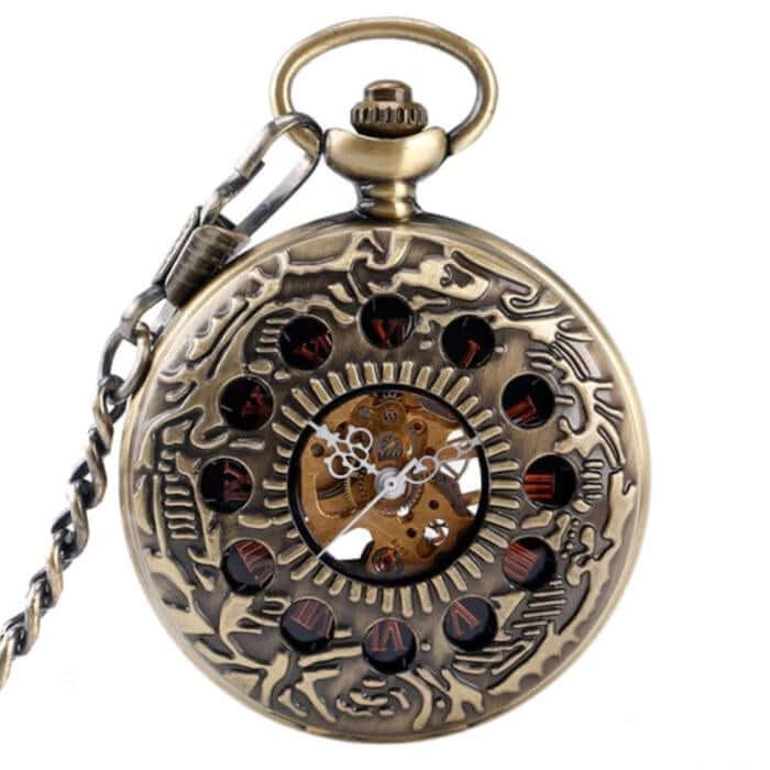 Ornate bronze pocket watch with exposed gears and chain.
