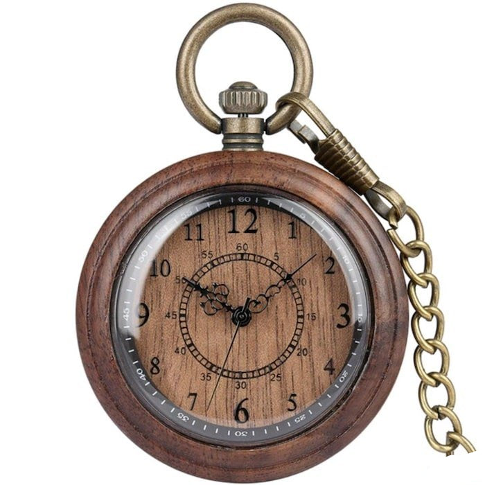 Close-up of a wooden pocket watch with a bronze-colored chain.