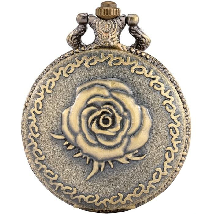 Bronze pocket watch with rose emblem.
