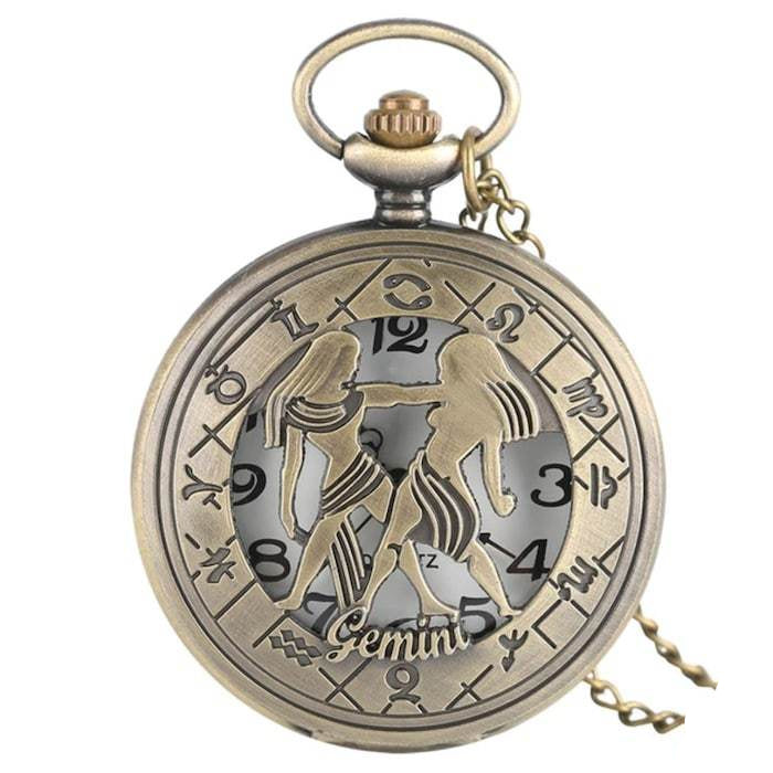 Bronze-colored pocket watch with astrological symbols and Gemini figures.